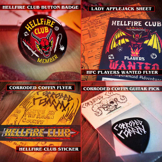 Collection of Hellfire Club merchandise including a button badge, flyer, guitar pick, and sticker.