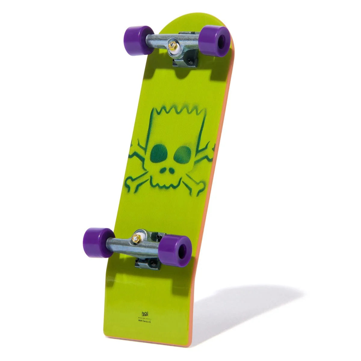 Skateboard with a green Bart Simpson skull design on a white background