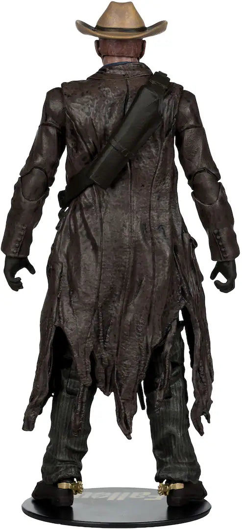 Action figure of a character in a cowboy outfit with a hat on a white background