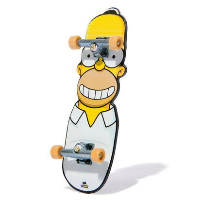 Tech Deck Skateboard with aHomer Simpson design on a white background