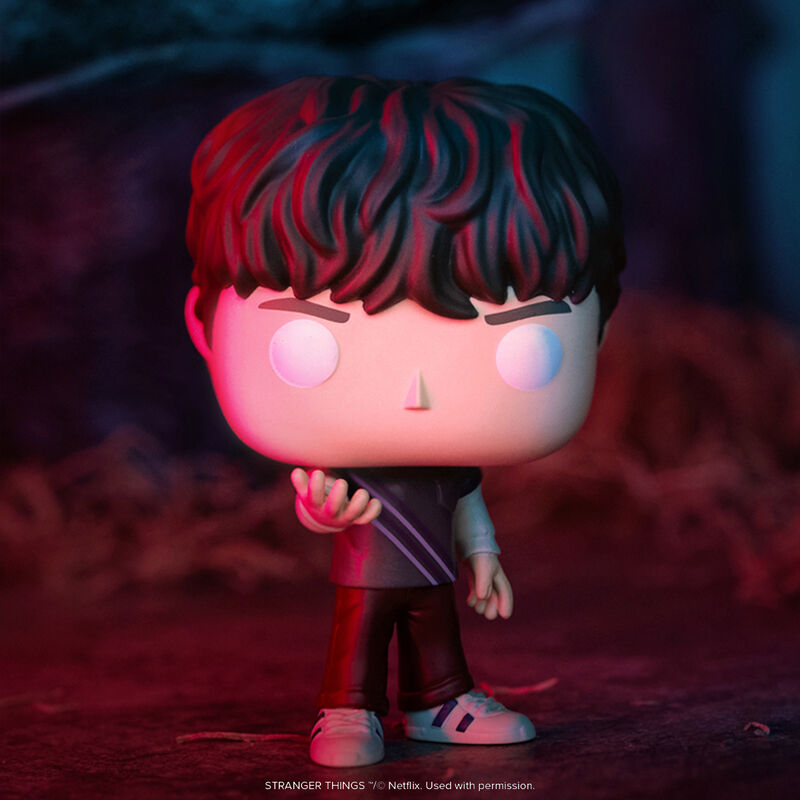 Funko Pop! vinyl figure of Will Byers with white eyes from 'Stranger Things' with a dark background