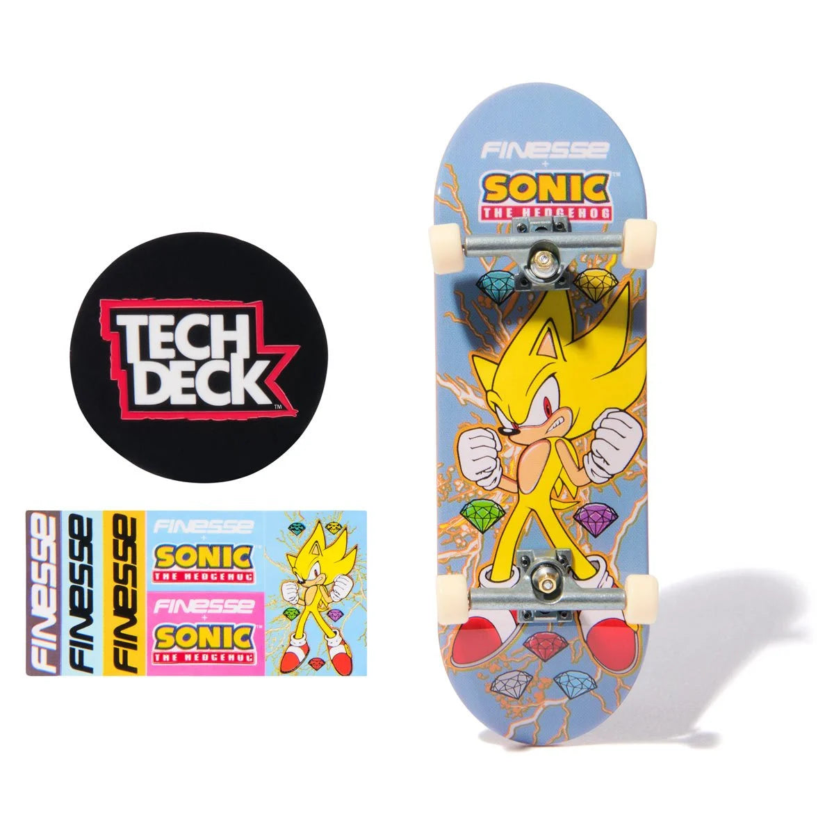 Skateboard deck with Super Sonic the Hedgehog design and Tech Deck branding.